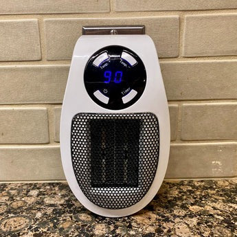 Compact Portable Electric Heater - Fast Heating, Energy-Efficient, Ideal for Home & Travel